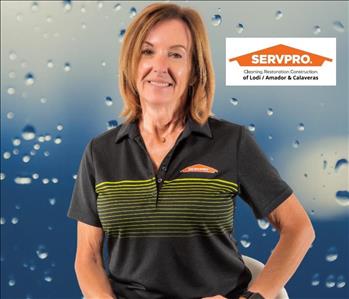 woman with brown hair in servpro shirt